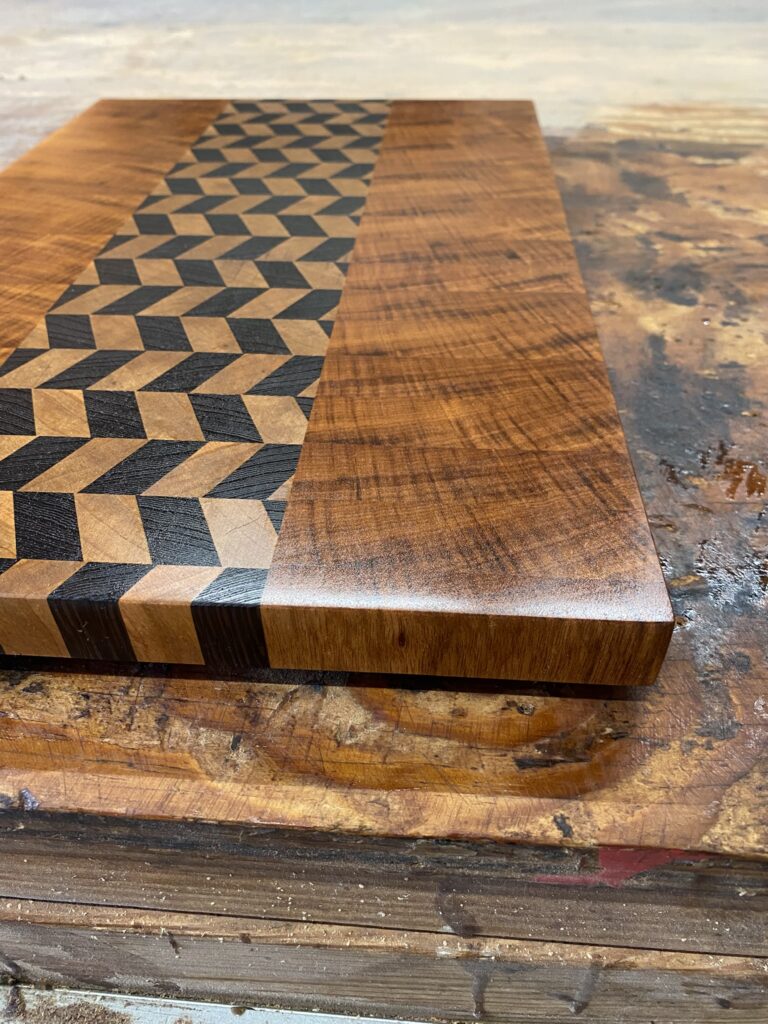Tigerwood Chevron End Grain Board handcrafted by Fifeco Woodworks